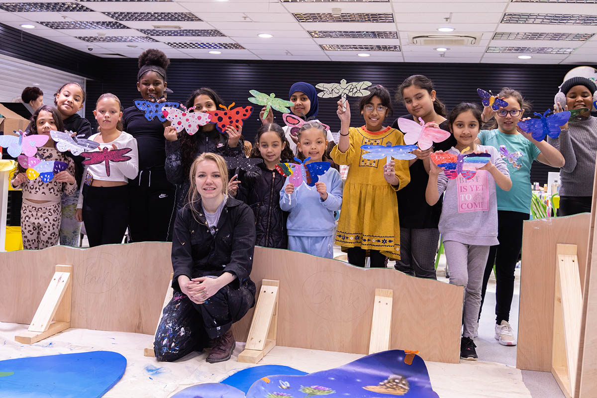 Image of pupils creating meadow art in a classroom